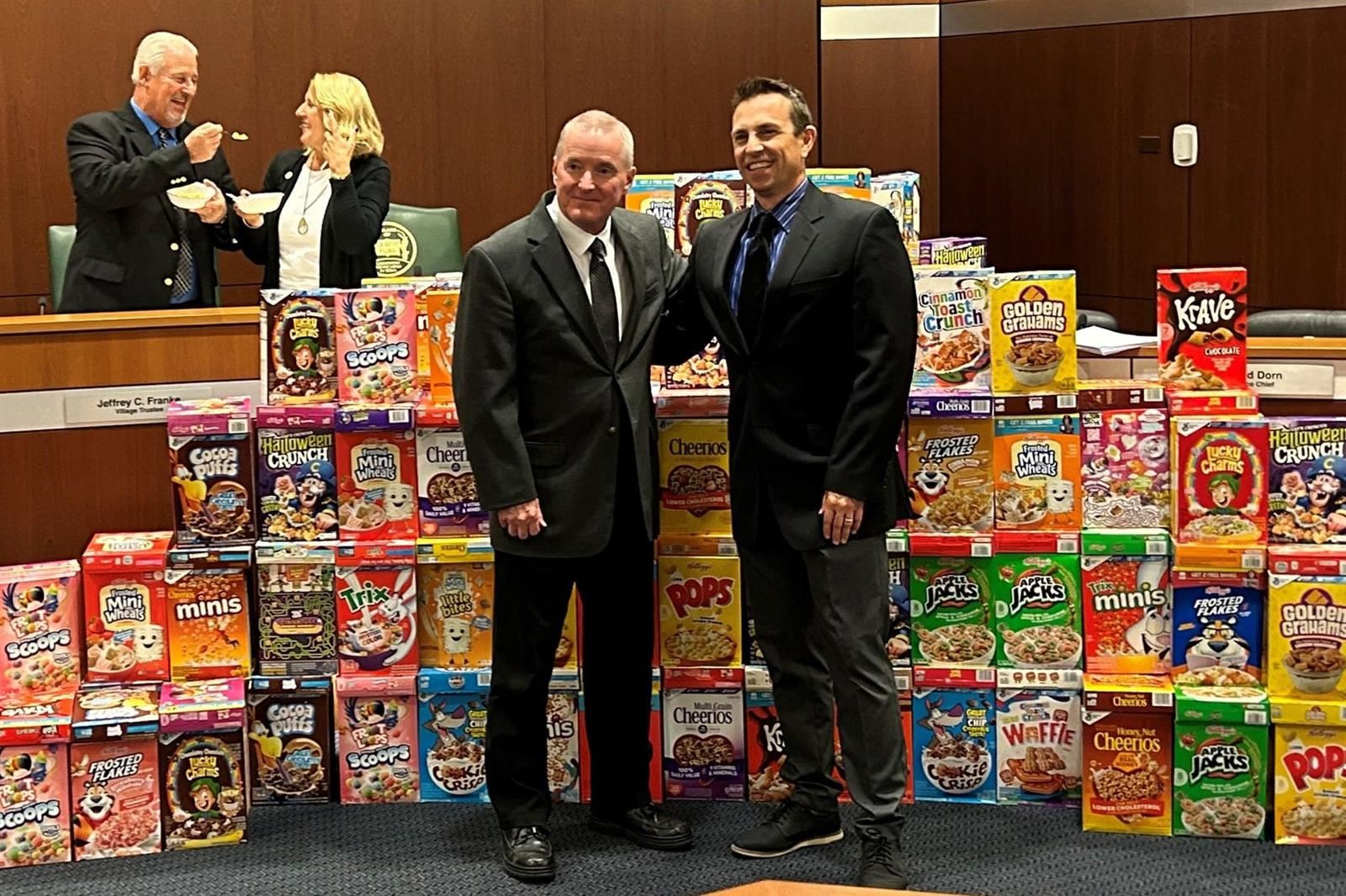 Elk Grove Village Mayor Craig Johnson stands with Elk Grove Village Trustee and Elk Grove High School Teacher Joe Bush